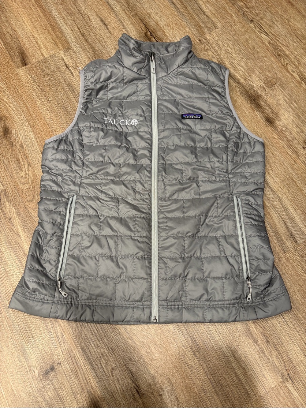 Patagonia Women's Light Gray Quilted Insulated Vest with Tauck Embroidery